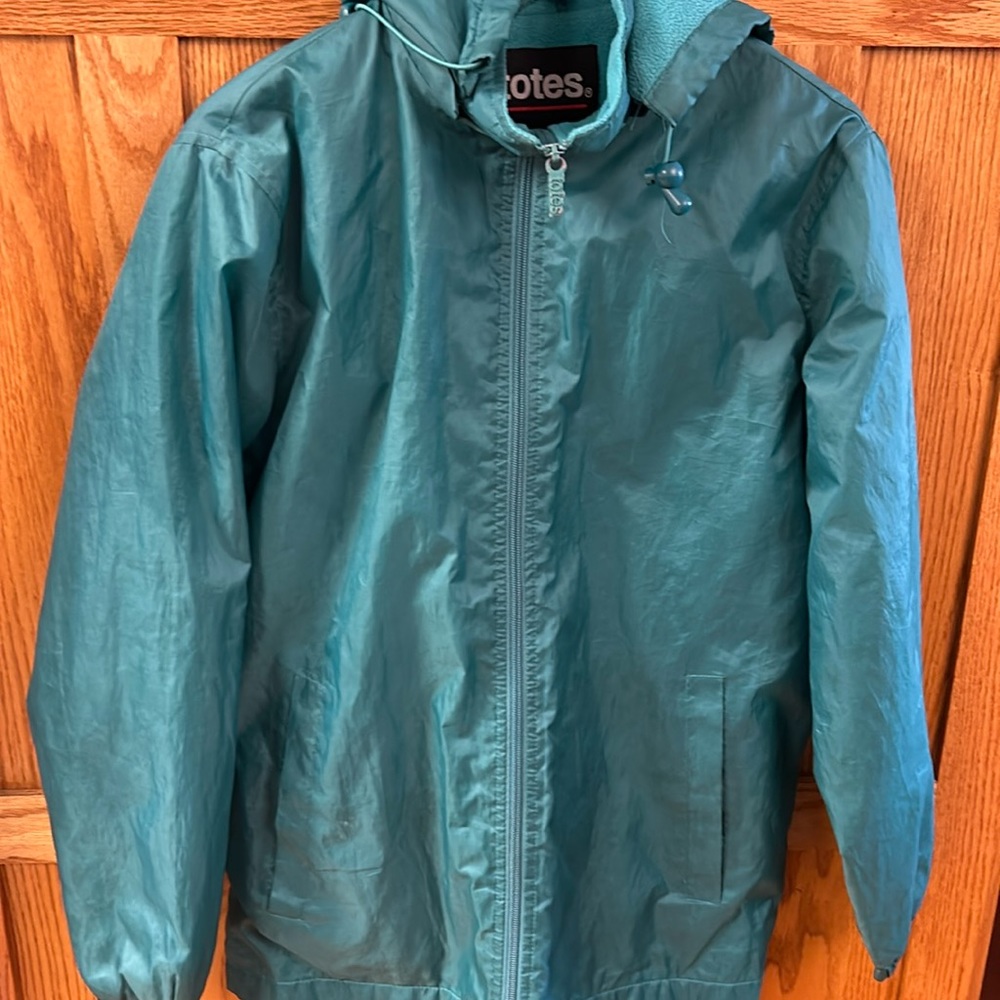 Small green Totes rain coat